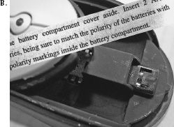 FIGURE 4.2. Cylindrical Battery: Where Constraints Are Needed. Figure A shows the traditional cylindrical battery that requires correct orientation in the slot to work properly (and to avoid damaging the equipment). But look at Figure B, which shows where two batteries are to be installed. The instructions from the manual are shown as an overlay to the photograph. They seem simple, but can you see into the dark recess to figure out which end of each battery goes where? Nope. The lettering is black against black: slightly raised shapes in the dark plastic.